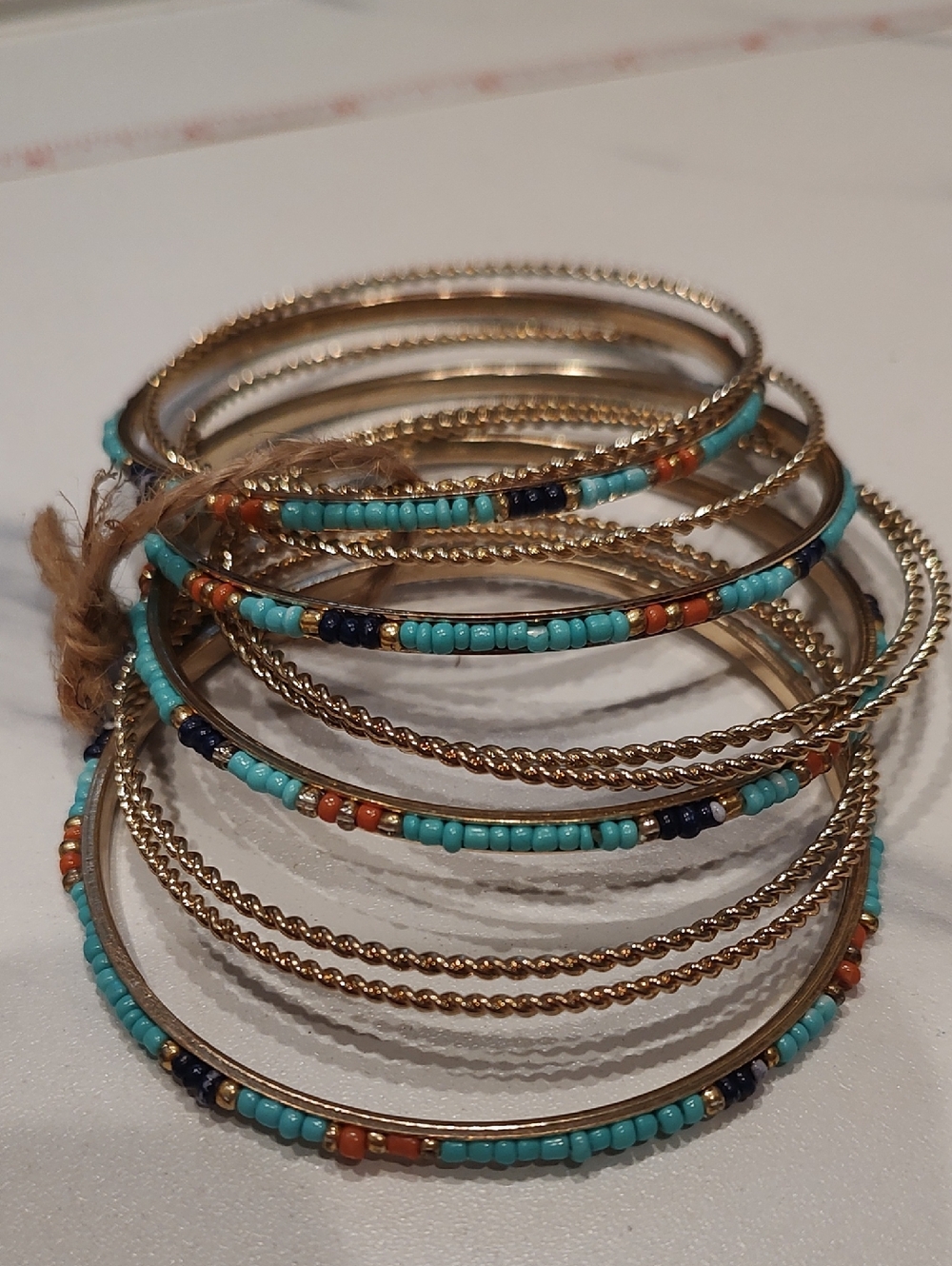 Set Of 10 Gold And Beaded Bangle Bracelets